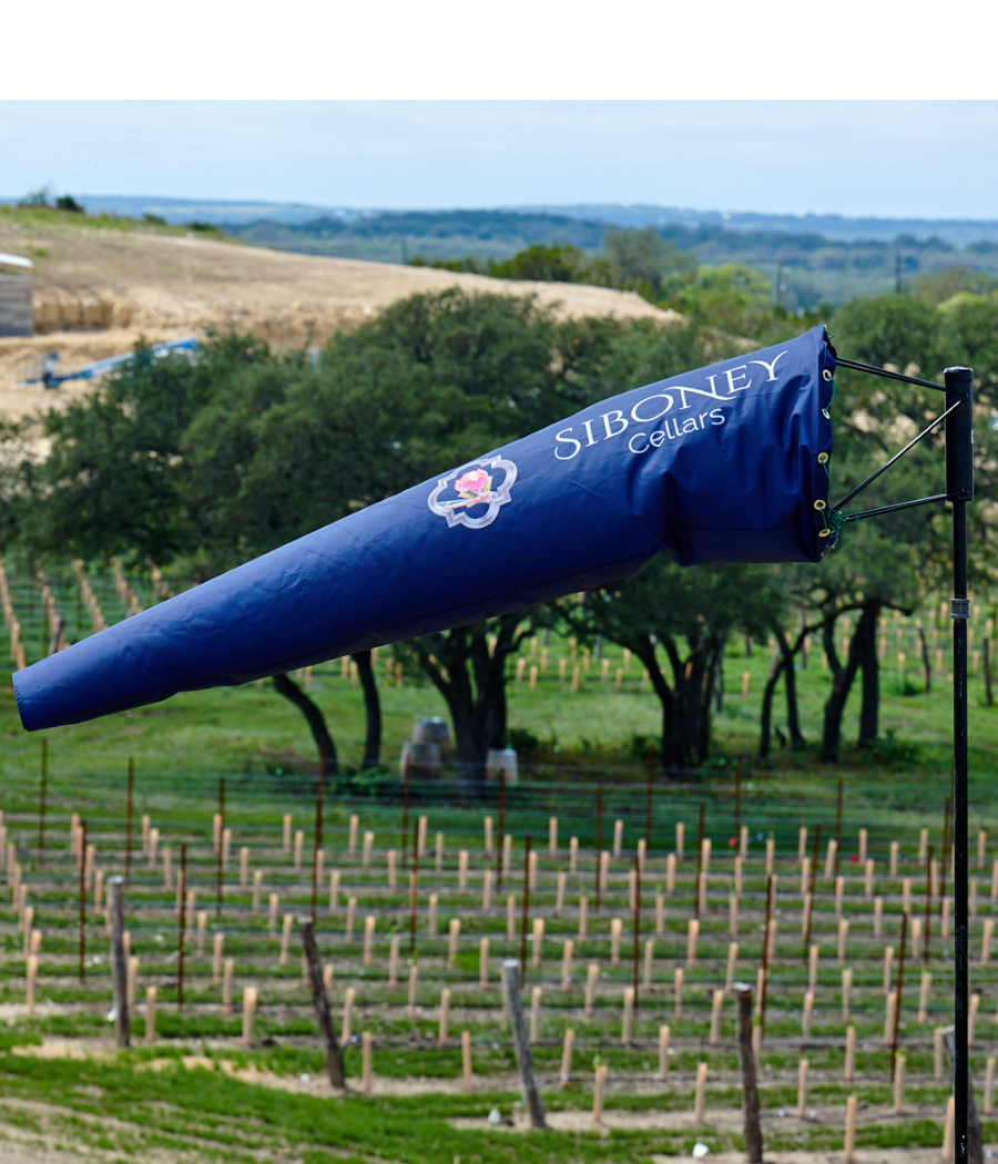 custom printed windsock for seeding, crop spraying, crop dusting purposes. custom printed with vineyard name on windsock 